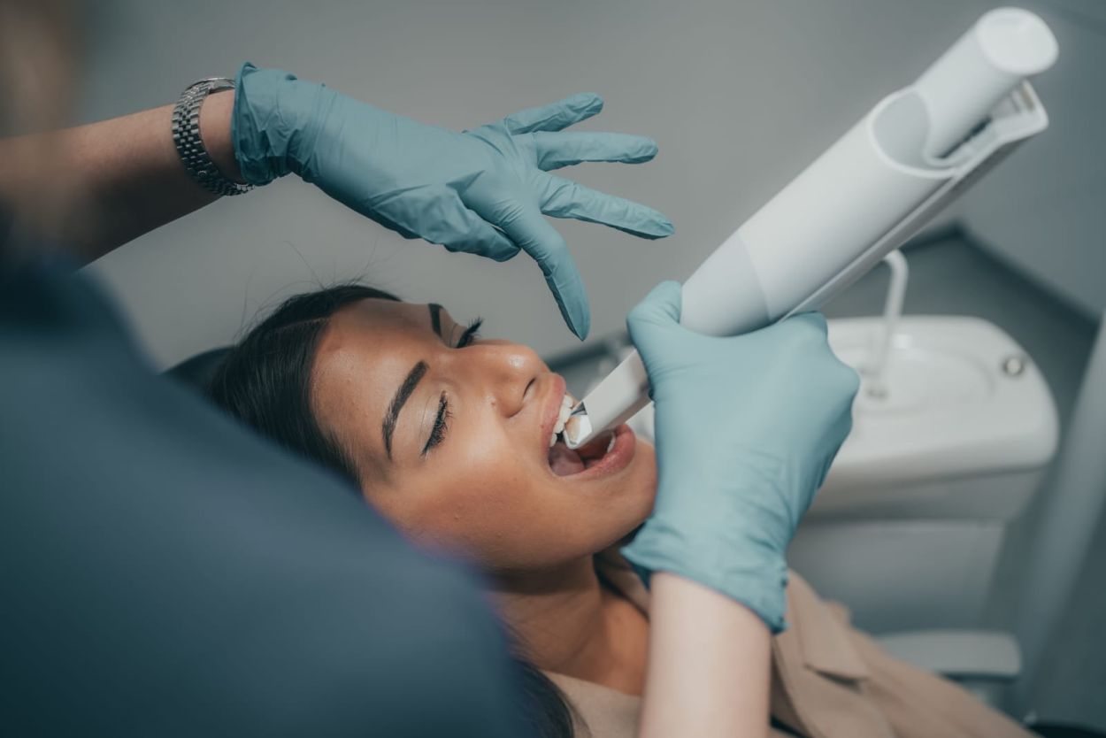 Dentist examining a patient with toothache